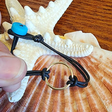 Load image into Gallery viewer, 14k Solid Yellow Gold Ring with Large Hand Carved Sleeping Beauty Turquoise Bead Closure Bracelet Bangle Genuine Black Natural Leather Cord